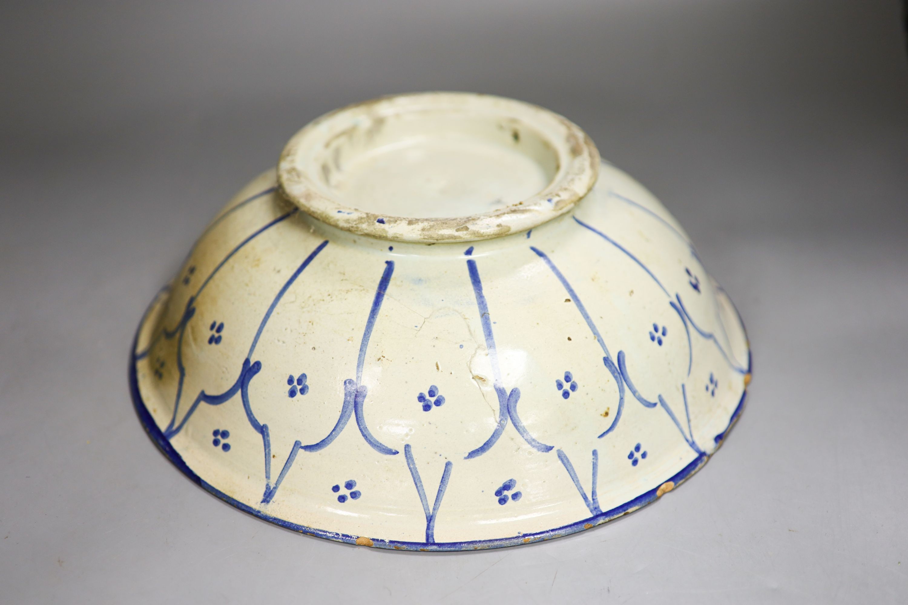 An Iznik style blue and white bowl 30cm